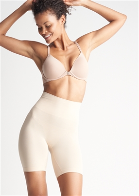 Nude mid waist thigh shaper with an extra wide shaping band and a comfortable side-seam free construction
