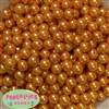 10mm Gold Faux Pearl Beads sold in packages of 50 beads