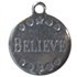 Small silver colored round charm with "BELIEVE"