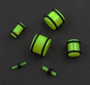 Glow in the dark green acrylic ear plug gauges with o-rings