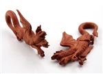 Sawo wood hanging ear plugs with a three-headed dragon design