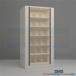 rotary file cabinets or rotating filing shelves that hold end tab file folders in a cabinet that rotates and locks