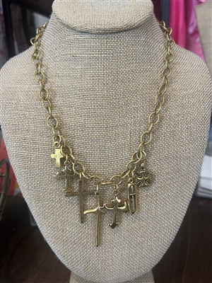 Women's 18 inch gold chain necklace with multiple crosses.