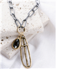 Women's 29 inch matte gunmetal chain necklace with 2 inch gold oval cross pendant with gray crystal.