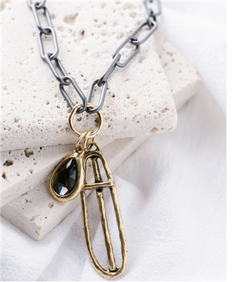 Women's 29 inch matte gunmetal chain necklace with 2 inch gold oval cross pendant with gray crystal.