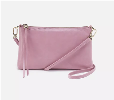 Women's leather crossbody handbag with top zip closure and back slip pocket in lilac rose from HOBO handbags.