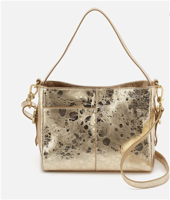 Women's open top render small crossbody handbag in gold from HOBO Bags.