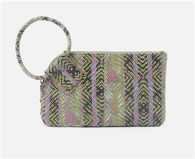 Women's HOBO leather clutch handbag in green and lilac geo diamond print with a circular handle and a top zip.