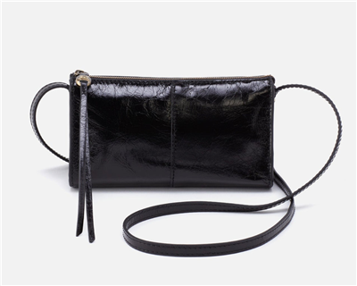 Women's small black leather top zip crossbody bag.