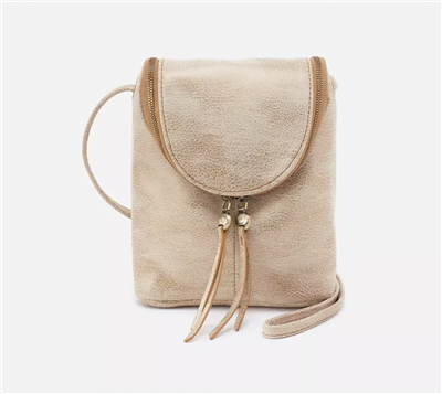 Metallic gold buffed hide crossbody handbag with zipper closure and adjustable strap.