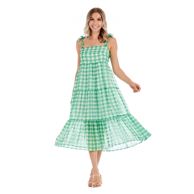 Women's midi sundress in green and white check with tiered skirt and adjustable tie straps.
