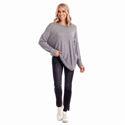 Women's speckled gray long sleeve sweater with single breast pocket and crew neck.