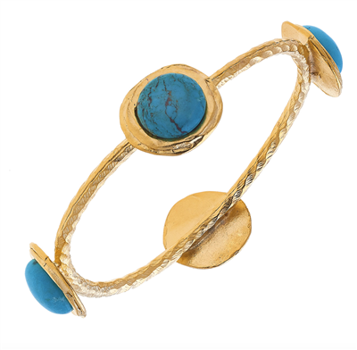 Women's gold bangle bracelet with turquoise.