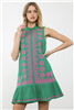 Green short sleeveless dress with pink embroidery on the front.