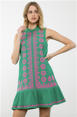 Green short sleeveless dress with pink embroidery on the front.