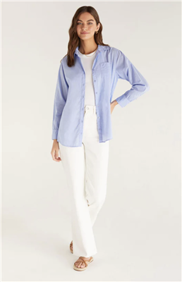 Women's oversized  cotton light blue long sleeve button front shirt.