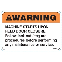 DECAL MACHINE STARTS UPON FEED DOOR CLOSURE, LOCKOUT/TAGOUT