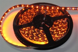 Orange Water Resistant LED Flexible Ribbon Strips | LED Ribbon Tape - Low power consumption, infinite uses.  We manufacture our LED Flexible Ribbon spools and Flex Ribbon Tape to ensure a quality product and the best possible price to you, our customer!