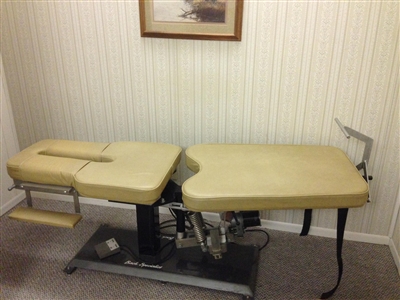 Used Back Specialist Traction/Distraction tables, 2 available (tan)