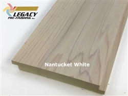 Cedar exterior shiplap siding with a smooth face prefinished in an off-white stain