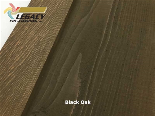 Beautiful Cedar board and batten siding custom prefinished in a rich dark brown stain called Black Oak.