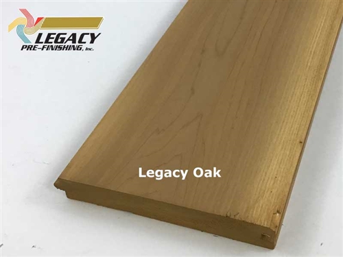 Cedar nickel gap siding custom prefinished in a golden brown stain called Legacy Oak