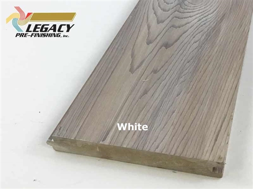 Cedar nickel gap siding custom prefinished in a white stain