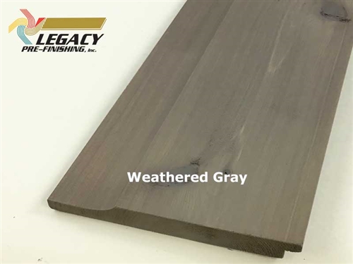 Cedar dutch lap siding with smooth face finished in a dark gray/brown stain called weathered gray