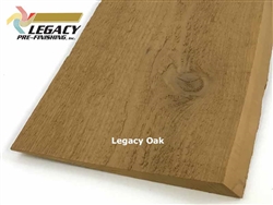 Haida wavy edge cedar siding prefinished in a custom golden brown stain called Legacy Oak