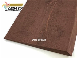 Haida wavy edge cedar siding custom prefinished in a rich dark brown/red stain called Oak Brown