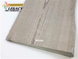 Haida wavy edge cedar siding prefinished in a whitewash stain