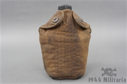 Original US WWII Canteen Dated 1944 (No Cup) With Cover (Heavily Stained)