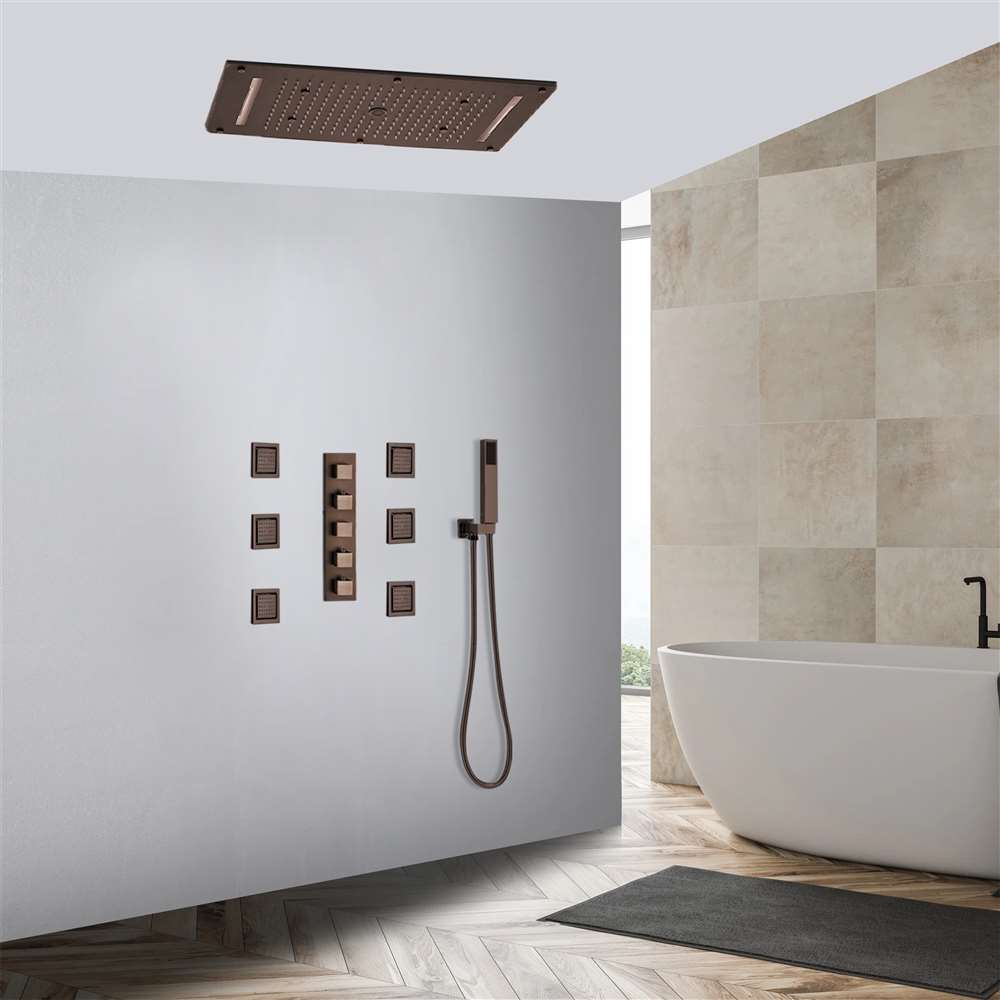 A luxury stand up grey marble shower with a rain shower head with