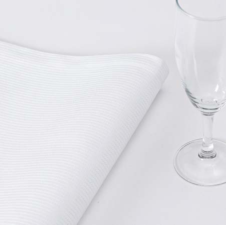 Offre White Table Linens by Le Jacquard Francais