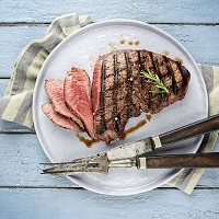 Bison NEW YORK Steak has intense bold flavor. It's not the most tender steak like filet mignon or ribeye steak. Bison New York Strip Loin Steaks are tender, lean and full of bold flavor.