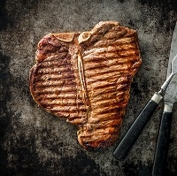 Bison porterhouse steaks are essentially two steaks in one. These large steaks are cut from where the striploin meets the tenderloin in the short loin section of the steer.