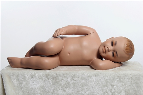 Sleeping toddler mannequin. Unisex toddler with realistic facial features.