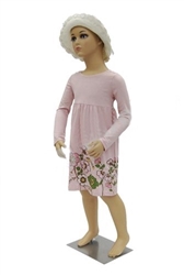 5 year old child in standing pose. Unisex child mannequin with realistic facial features.