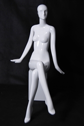 Glossy White Abstract Female Mannequin in Seated Pose from www.zingdisplay.com