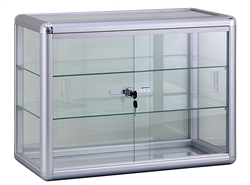 Glass Countertop Display. Comes with 2 glass shelves and a sliding glass door that locks. Shop all of our countertop displays at www.zingdisplay.com