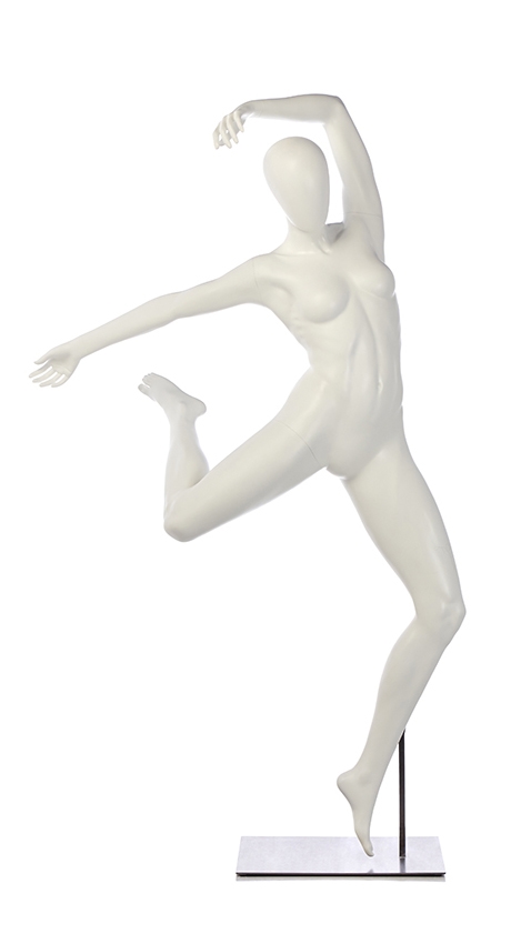 Wooden mannequin in a ballet pose Stock Photo