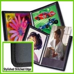 Sheet protector book with stylish stitched edge and black acid free mounting sheets for 8"x10" pages