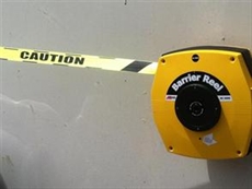 Superior - Fluoro Yellow/Black 15m. Retractable Barrier Tape with text CAUTION