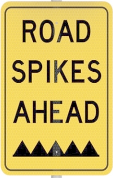 Road Spikes Ahead Sign