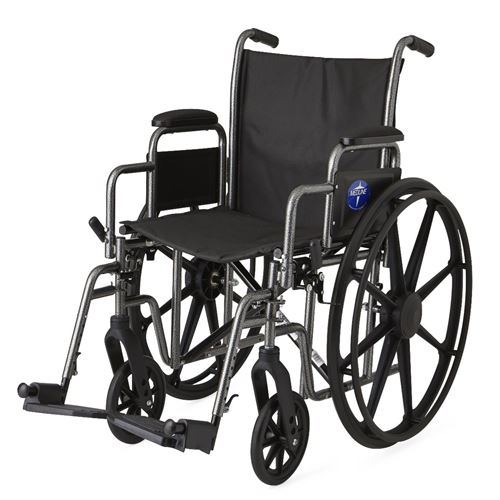 Excel K1 Basic Wheelchair: 18" Desk-length arms, swing-away detachable  footrest