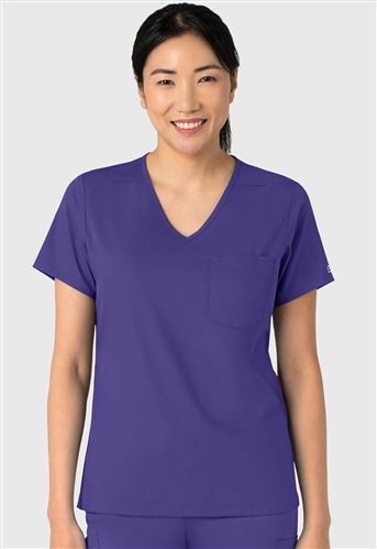 Boundless Womenâ€™s Tuck-In Scrub Top in modern V-neck style with high-low hem and zip pocket