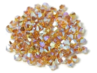 Preciosa Machine Cut 4mm Bicone Crystals : CZBC4-2X1007 - 2AB Topaz - 25 count