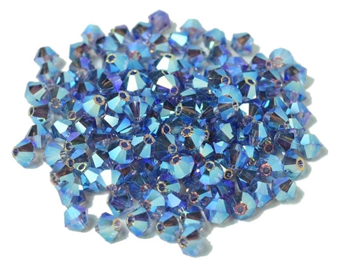 Preciosa Machine Cut 4mm Bicone Crystals : CZBC4-2X20410 - 2AB Tanzanite - 25 count