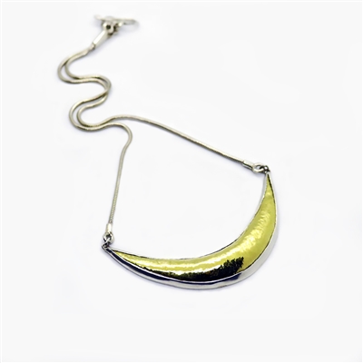 18k gold, fine and sterling silver hammered to shape.
