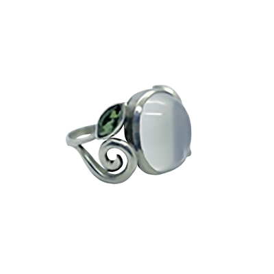 Romance Ring photo. Polished finish silver structure with a moonstone in the center and green tourmaline on the sides for accents looking like leaves. Very romantic, from the romance collection.